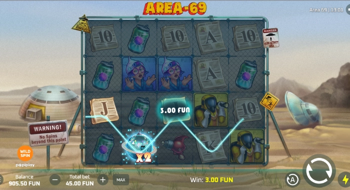 The AREA-69 slot game screen by pepiplay shows a 4x4 grid with alien, human, and object symbols, a WARNING message, a WILD SPIN option, a 905.50 FUN balance, a 45.00 FUN bet, and a 3.00 FUN win, set against a desert and UFO background.