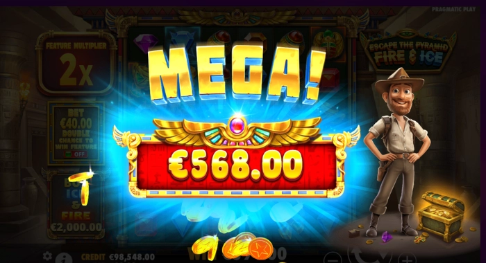 A MEGA! win of €568.00 is displayed in the Escape the Pyramid: Fire & Ice slot game, with a 2x multiplier, a €40 bet option, a €2,000 buy feature, a €98,548 credit, and a cartoon adventurer character next to a treasure chest.
